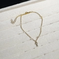Delicate 18K gold plated bracelet featuring a sparkling zircon studded letter T charm - Letter T