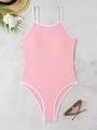 Flat lay of pink one-piece swimsuit with white trim and textured fabric on stone background - S / Pink