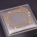 Bracciale regolabile in acciaio dorato con ciondoli a forma di stella in smalto blu - Bracciale Stella
