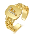 Gold adjustable ring with letter F diamond accent and watch strap chain design - Letter F