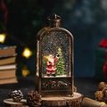 Farol de Navidad de bronce vintage con escena de Papá Noel y nieve con purpurina - Papá Noel