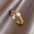 Gold open ring with woven texture band and round white cat eye stone on grey silk - Vintage Cat Eye