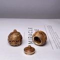 Exquisite hollow sandalwood pomander set with brass inlay showing open and closed views - Approx 2.8*2.6cm