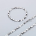 Macro detail of silver-tone hollow rectangular link necklace and bracelet jewelry set - Necklace 65cm / Silver/Steel