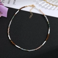 Detail of colorful handmade stone beaded necklace with gold spacers and lobster clasp - Style 5