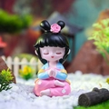 Cute resin girl figurine in blue and pink traditional outfit for home decor - Praying Hands Style