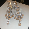 Macro shot of silver tassel earrings with square rhinestones for formal evening wear - Silver (Silver Pin)