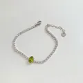 Silver stainless steel tennis bracelet with white zircons and green gemstone oval center - Silver/Olive Green Zircon (SBP417)