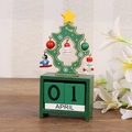 Close-up of wooden Christmas tree calendar with festive ornaments and date blocks - 1811-Green Christmas Tree