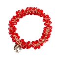 Detail showing red crystal beaded elastic hair tie with golden Jayce Rose pendant - 7# Red Crystal Hair Tie