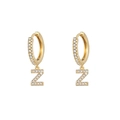 Minimalist gold hoop earrings featuring letter Z pendant with sparkling cubic zirconia stones - Letter Z / Gold
