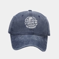 Close-up of navy washed cotton baseball cap with white motherhood skull print - Adjustable / Navy Blue