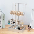 Three-tier silver metal jewelry organizer stand with necklace bar and earring tray - Silver
