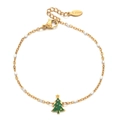 Detail of gold stainless steel bracelet with green Christmas tree charm and white beads - White