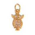Detailed view of a golden owl charm with sparkling white zircons for DIY jewelry making - Owl