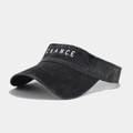 Close-up of white CHANCE embroidery on a black washed denim visor for outdoor sun protection - Black