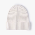 Classic pure white ribbed knit beanie hat with turn-up cuff for winter warmth - Cream