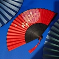 Japanese style folding fan with red fabric, gold floral patterns and red tassel - Black Rib Red Surface Flower
