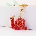 Simpatico portachiavi a lumaca dorata con strass rossi e ciondolo a forma di insetto chic - Rosso