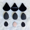 Detail of 9-piece makeup sponge set featuring black velvet puffs and teardrop blenders - Black 9-Piece Set