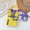 Detail of a yellow knitted phone bag featuring cartoon eyes and purple strap on a desk - Yellow Cartoon Big Eyes Style