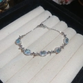 Elegant bow bracelet with light blue oval gemstones and silver-toned adjustable chain - 1# Silver Blue Bow Style