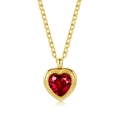 Close-up of gold plated necklace with a faceted red heart gemstone and beaded edge detail - Gold Heart Red Gemstone