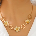 Golden flower petal necklace featuring textured solid and hollow floral metal elements - Gold Five-Flower Necklace (M-316)