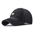 Detail view of retro washed denim baseball cap featuring a white 3D embroidered W letter - Adjustable / Black Denim