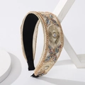 Elegante haarband met gouden vlinderborduurwerk en lovertjes op crèmekleurige stof - Effen Stijl / Goud