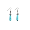 Detail of bohemian turquoise hexagonal pillar earrings with vintage engraved silver caps - Light Blue Turquoise