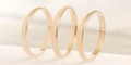 Detailed view of three stackable titanium steel rings with polished and frosted finishes - US 5 / Polished and Frosted Combination Style / Rose Gold