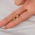 Polished 14K gold plated stainless steel mini heart stud earrings on fingers - 3D Heart Shape