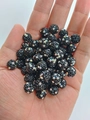 Close-up of hand holding black Shamballa clay beads with colorful rhinestones for DIY - 10mm / Black AB