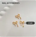 Amuletos de lazo dorado de aleación para nail art, 8x11mm para decoración de uñas DIY - Dorado Grande