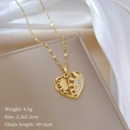 Detail of gold hollow heart necklace with Guadalupe relief and sparkling zircon inlay - Gold Heart Virgin Mary Relief Style (C212)