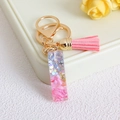 Pink glitter resin letter I keychain with a soft pink tassel and gold lobster clasp - Letter I / Pink