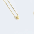 Minimalist gold-polished necklace featuring a Capital Letter K pendant and cross chain - Letter K