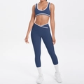 Detail of navy blue yoga set with white contrast trim and V-shaped crossover waistband - S / Dark Blue