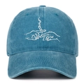 Close-up of white creative line art embroidery on washed blue cotton baseball cap - Lake Blue