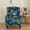 Tropical floral stretch wingback chair cover in deep teal with leaf patterns - Forest Wonderland