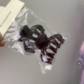 Detail view of mini jelly hair claws in dark brown and black colors for styling - Small Keel (Dark Coffee + Wine Red)