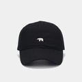 Detailed close-up of white polar bear embroidery on a classic black cotton baseball cap - Adjustable / Black