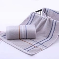 Absorbent pure cotton towel with purple and blue stripes in a soft rolled display - Striped Border Grey / 34*74cm