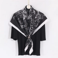 Detail of black and white printed square silk scarf with a golden scarf buckle fastener - 90x90 Twill / Black