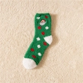 Green coral fleece Christmas socks featuring white dots and Santa Claus embroidery - Embroidered Santa