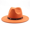 Detail of orange wide brim wool fedora hat featuring star studs on black decorative band - Orange