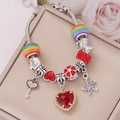 Detail of beaded snake chain bracelet with heart charms and crystal resin beads - Red