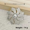 Silver star brooch with large pearl center and rhinestone petals on beige lace - Silver Radiant Firework