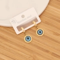 Macro detail of gold stainless steel earrings with blue evil eye pendant on wood background - 9# Round Blue Eye Design Style